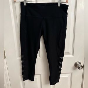 Black leggings with sheer design on side of leg